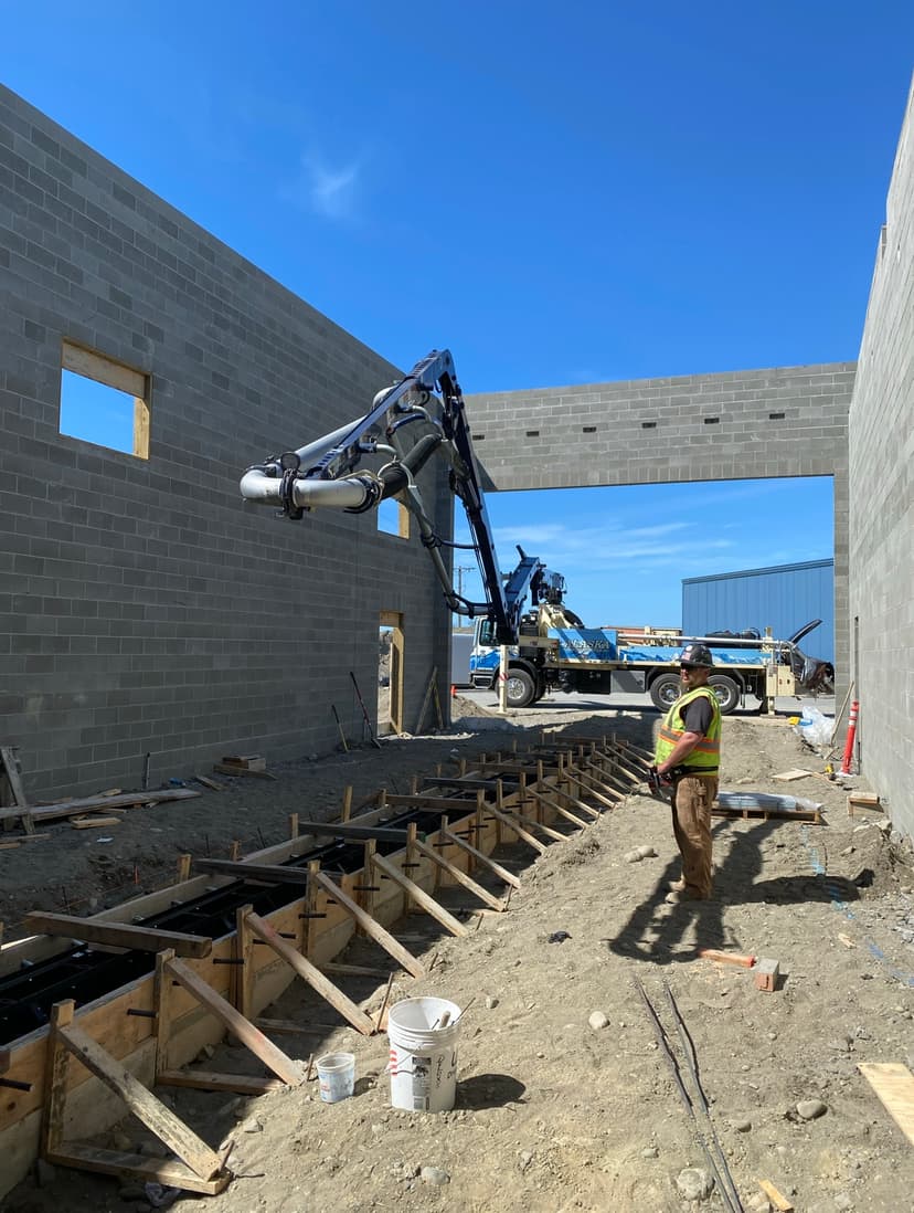 Pouring concrete for the Homer Airport chemical building.